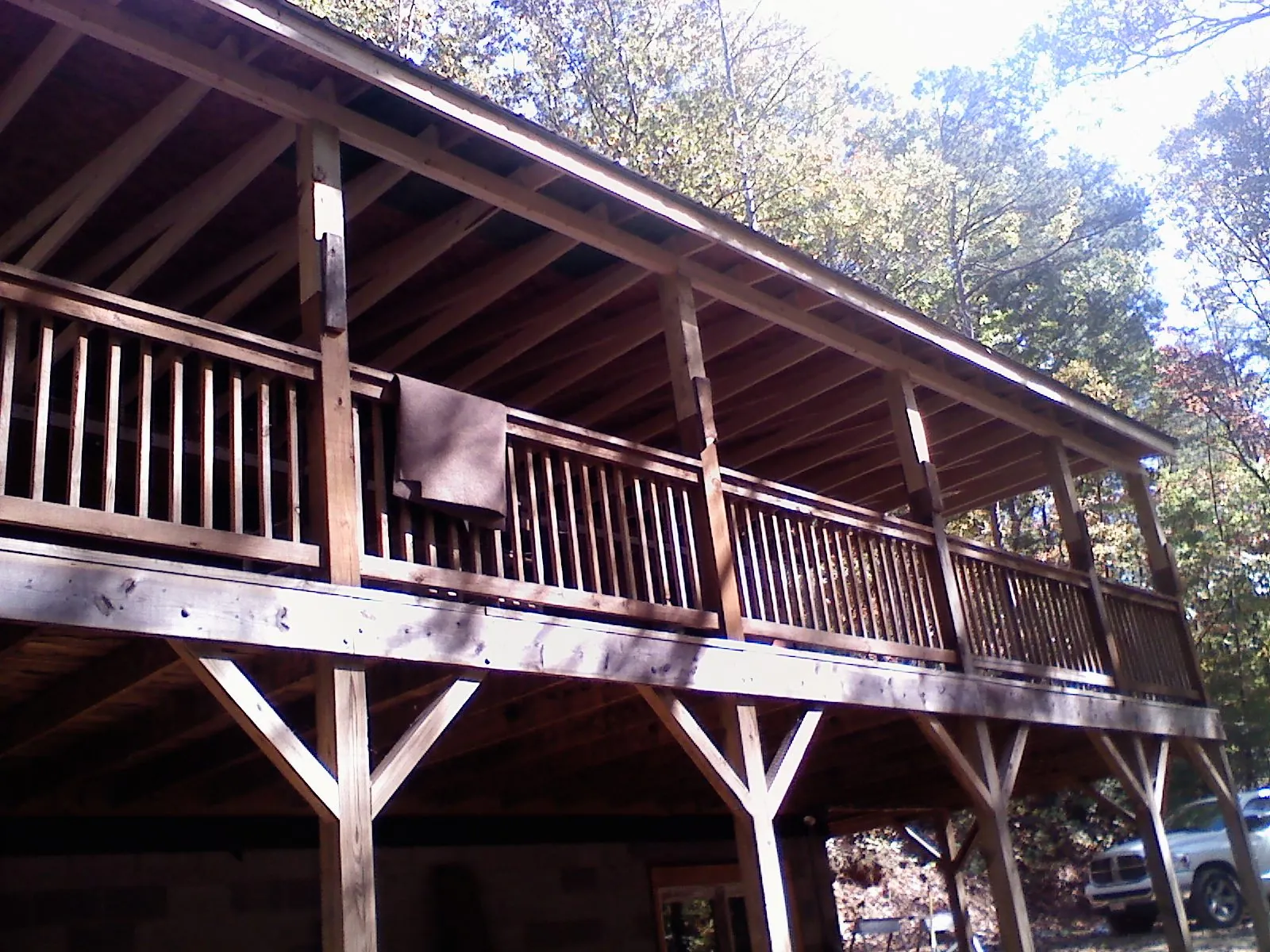 Timber framing under a new elevated porch and deck — Roof Leak Repair in Glen Allen by Roofing Brothers